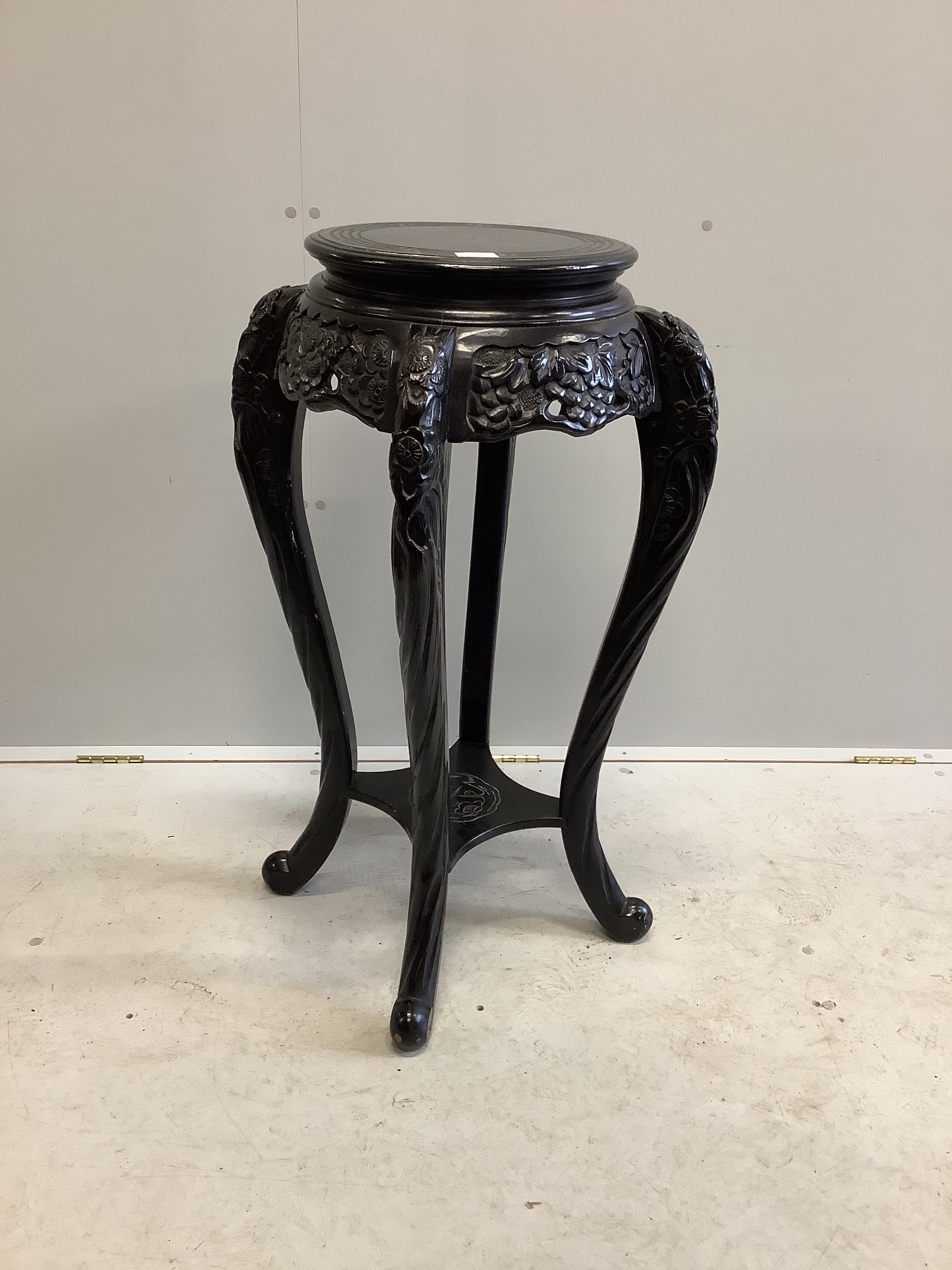 A Chinese ebonised vase stand, height 91cm	